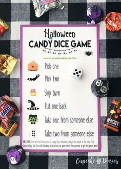 halloween candy dice game on a checkered tablecloth