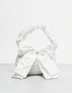 True Decadence bow detail grab bag in white satin | ASOS Spring Evening Bag With Bow, White Party Bag With Bow, White Party Bags With Bow, Chic Wedding Bag With Bow, Chic Wedding Bags With Bow Detail, Chic Wedding Bags With Bow, Coquette Bag, Pearl Bow, Bow Bag