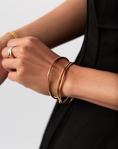 Trio Molten Ripple Bangle Bracelet Set | 18k Gold Vermeil. More is More. Make a Statement with this Standout Bracelet Set, Featuring Three of Our Molten Ripple Bangles. This Delicate Bangle Bracelet Features an Organic-Inspired Shape with Our Signature Molten Wavy Detailing. Stack All Three Together, Balance Out Across Both Wrists, or Wear Solo for Endless Ways to Style. Worth $693, Save $84 When Buying Together. Metal: 18K Recycled Gold Vermeil on Recycled Sterling Silver Small Band Width Varie Small Band, Trending Bracelets, More Is More, Ring Trends, Bangle Bracelet Set, Earring Trends, Gold Signet Ring, Diamond Gift, Festival Jewelry