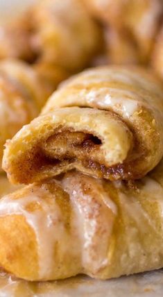 cinnamon rolls are stacked on top of each other