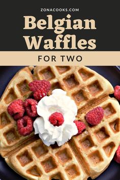 waffles topped with whipped cream and raspberries on a black plate, with the words belgium waffles for two