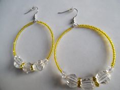 Yellow and clear beaded hoop earrings Yellow seed beaded hoop | Etsy Yellow Beaded Earrings With Gold Round Beads, Yellow Gold Beaded Round Earrings, Yellow Beaded Earrings With Colorful Beads, Yellow Hoop Earrings With Dangling Beads, Yellow Beaded Earrings With Multicolor Beads, Yellow Beaded Hoop Earrings, Yellow Round Beaded Earrings, Yellow Colorful Beaded Hoop Earrings, Handmade Clear Round Hoop Earrings