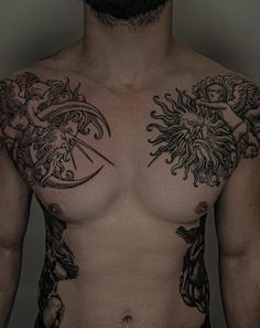 a man with some tattoos on his chest