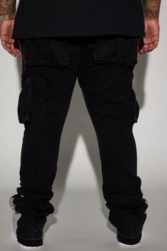 Model Height: 6'4 - Waist: 34 Big & Tall Height : 6'3 - Waist: 42 Available In Black. Stretch Fabric Stacked Flared Fit 5 Body Pocket Zip Fly Button Closure Contrast Panel Cargo Pockets 98% Cotton 2% Spandex Imported | Mens Carried Cargo Stacked Skinny Flared Jeans in Black size 34 by Fashion Nova Black Stretch Cotton Cargo Jeans, Fitted Cargo Jeans With Multiple Pockets For Streetwear, Fitted Black Cotton Cargo Jeans, Fitted Black Cargo Jeans With Pockets, Black Fitted Cargo Jeans, Urban Fitted Cargo Jeans For Streetwear, Stretch Cargo Jeans With Side Pockets For Streetwear, Big & Tall, Flare Jeans