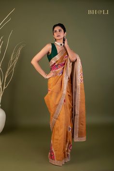 This exquisite handloom tussar silk saree features intricate gota and pearl work, handcrafted with precision and care. The digitally printed design adds a modern touch to this traditional piece, while the soft and flowy fabric ensures comfort and elegance. The perfect choice for those seeking a smart and contemporary saree. Semi-stitched Tussar Silk Saree With Gota Work, Unstitched Raw Silk Saree With Gota Work, Designer Handloom Tussar Silk Saree, Semi-stitched Tussar Silk Dupatta With Gota Work, Tussar Silk Dupatta With Gota Work, Diwali Tussar Silk Traditional Wear With Gota Work, Traditional Tussar Silk Saree With Gota Work, Tussar Silk Saree With Gota Work In Traditional Drape, Traditional Tussar Silk Pre-draped Saree With Gota Work