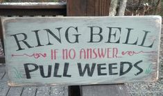 a sign that says ring bell if no answer, pull weeds on the back porch