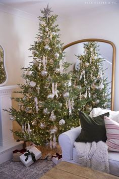 a decorated christmas tree in a living room