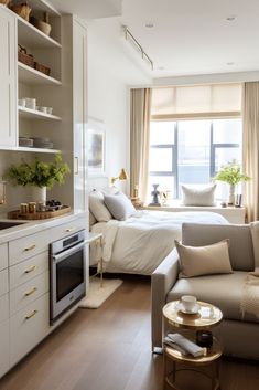 a living room filled with furniture next to a window