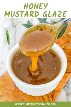 honey mustard glaze in a white bowl with a spoon