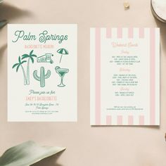 wedding stationery with palm trees, cocktails and menu on pink tablecloth next to candle