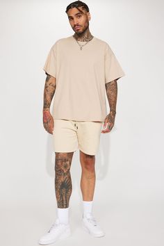 Model Height: 6'4 - Wearing Large Big & Tall: Height 6'5 - Wearing XXXL Available In Tan. Crew Neck Short Sleeve Oversized 100% Cotton Imported | Mens Essential Oversize Short Sleeve Tee Shirt in Tan size XL by Fashion Nova Beige Short Sleeve T-shirt For Loungewear, Oversized Beige Shirt For Summer, Oversized Beige Summer Shirt, Oversized Beige T-shirt For Summer, Casual Beige Drop Shoulder Tops, Beige Summer Streetwear Shirt, Summer Beige Streetwear Shirt, Relaxed Drop Shoulder Summer Top, Beige Relaxed Fit Shirt For Streetwear