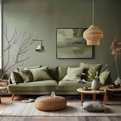 a living room filled with lots of furniture next to a wall mounted painting on the wall