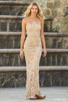 Sherri Hill 55559 - Fully beaded fitted gown with halter pointed neckline.