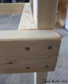 a close up view of some wood with holes in it