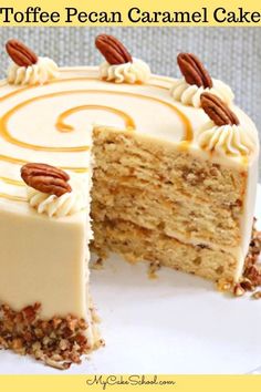 a cake with white frosting and pecan caramel toppings is cut into slices