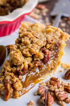 a slice of pecan pie on a white plate