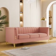 a living room with a pink couch and rug