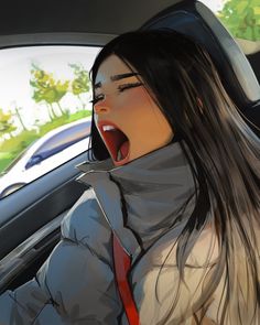 a woman with her mouth open sitting in a car