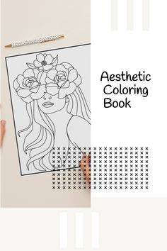 an adult coloring book with flowers on it and the title aesthetic coloring book written in black