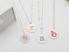 Introducing our exquisite Custom Initial Necklace, the perfect personalized jewelry gift for her. Handcrafted with love and attention to detail, this necklace is designed to capture the essence of individuality and style. The delicate pendant features a beautiful initial that holds a special meaning, making it a truly unique and heartfelt gift. Made with high-quality 925 Sterling Silver, this Custom initial necklace is both stylish and durable, ensuring it will be cherished for years to come. Whether it's for a birthday, anniversary, or just because, our Custom Initial Necklace is guaranteed to bring a smile to her face and a reminder of the love and thoughtfulness behind it. Shop now and add a touch of personalization to her jewelry collection. *MATERIAL High Quality 100 % 925 Sterling Si Personalized Initial Pendant Necklace For Birthday, Pink Engraved Necklace For Gift, Pink Initials Jewelry As A Gift, Mother's Day Gift Initial Necklace With Round Pendant, Personalized White Charm Necklaces For Best Friend Gift, Pink Initials Jewelry Gift, Personalized White Charm Necklace For Best Friend Gift, Silver Monogram Charm Necklaces Gift, Silver Monogram Charm Necklace For Gift