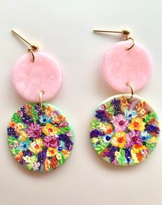 Hand made polymer clay earrings in translucent colors and rose quartz effect. Hand painted floral design with acrylic paints and matte sealer. Hypoallergenic stainless steel in golden color. Extremely lightweight. **Thank you for visiting my shop! All my earrings are hand crafted and original designs. Painted earrings are hand painted with out the use of templates. Some slight variations may occur. If you have any special requests, I'll be glad to do my best to accommodate. Please let me know if Hand Painted Polymer Clay Drop Earrings, Hand Painted Polymer Clay Flower Drop Earrings, Hand Painted Flower Polymer Clay Earrings, Whimsical Pink Polymer Clay Earrings, Handmade Pink Polymer Clay Flower Earrings, Pink Hand Painted Flower Drop Earrings, Artsy Pink Polymer Clay Earrings, Pink Artsy Polymer Clay Earrings, Artistic Hand Painted Pink Earrings