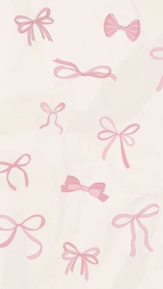 pink bows and ribbons on white paper