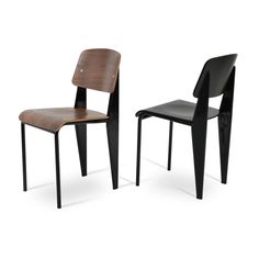 two black chairs with wooden seat and backrests