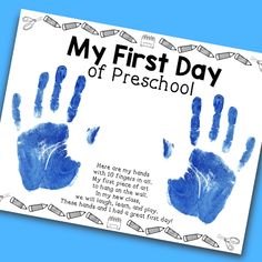 a blue handprint with the words my first day of preschool