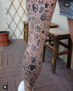 a person with many tattoos on their legs