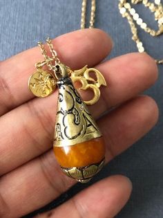 Give or have this necklace to guide you to the right direction to the enlightenment. This will make a great gift to whom are searching for true self and wisdom. *Orange Resin Pendant measures 38mm x 15mm ---------------------------------------- https://www.etsy.com/listing/111962735/yoga-jewelry-tibetan-bead-jewelry-pearl?ref=shop_home_active_2 ---------------------------------------- *JEWELRY CARD OPTIONS* Please indicate your choice of a message or your personals message in the 'message to sel Spiritual Necklaces With 108 Beads For Rituals, Spiritual Large Pendant Jewelry For Meditation, Holistic Jewelry With 108 Beads For Rituals, 108 Beads Jewelry For Healing And Festivals, Symbolic Necklaces For Meditation And Festivals, Healing 108 Beads Jewelry For Festivals, Bohemian Jewelry With Large Pendant For Meditation, Spiritual Nickel-free Pendant Necklace, Nickel-free Spiritual Pendant Necklace