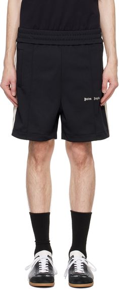 These Palm Angels shorts are made of polyester jersey. They feature an elasticated waistband, two-pocket styling, and a pinched seam at the front. A logo is embroidered at the leg. They also have striped trim at the outseams. Track Shorts, Classic Logo, Palm Angels, Logo Embroidered, Jersey Shorts, Short Outfits, Apparel Accessories, Track, Trim