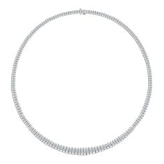 This sleek tennis necklace features a remarkable 26.55 carats of shimmering diamond baguettes. It is a fantastic gift to commemorate any milestone.- Platinum weighing 65.60 grams - 185 straight baguettes totaling 26.55 carats (GIA-graded D-E color, VS2+ clarity One-of-a-kind pieces. Available in White gold only. Item no. N10437