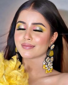 Get ready to glow like never before with our stunning haldi makeup! Our expert team will create a beautiful look that enhances your natural beauty and complements your outfit perfectly. With flawless skin, radiant eyes, and a touch of gold, you'll be sure to turn heads and feel amazing on your special day. Say goodbye to dullness and hello to a gorgeous, luminous look that will make you feel like a true queen. Trust us to make your haldi ceremony even more unforgettable with our impeccable makeup skills.  #shaadidukaan#weddingplanning#haldilook #haldiceremony #haldi #haldioutfit #haldibride #haldifunction #haldidress #haldijewellery #haldiphotography #haldidecor #haldimakeup #bride #haldishoot #haldinight #wedding #makeup #makeupartist #bridalmakeup #haldidecoration #haldiday #bridetobe Eye Makeup For Haldi Ceremony, Haldi Eyes Makeup, Haldi Mehndi Eye Makeup, Haldi Ceremony Hairstyle, Bridal Haldi Makeup, Haldi Bride Makeup, Mehndi Eye Makeup, Haldi Bridesmaid, Haldi Makeup Look For Bride