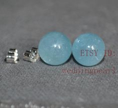 Aquamarine Beaded Jewelry For Gifts, Light Blue Gemstone Round Earrings, Silver Aquamarine Round Earrings, Aquamarine Matching Earrings Jewelry, Aquamarine Round Jewelry With Matching Earrings, Elegant Light Blue Round Bead Earrings, Elegant Light Blue Round Beaded Earrings, Aquamarine Earrings Gift, Light Blue Round Bead Earrings For Gift