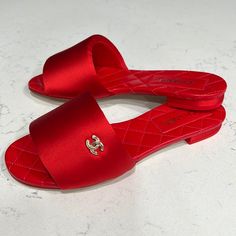 Bnib Chanel Sandals In Red. Red Classic Sandals With Round Toe, Classic Red Round Toe Sandals, Classic Red Sandals With Round Toe, Red Slip-on Sandals For Evening, Classic Open Toe Sandals With Red Sole, Red Flat Heel Sandals For Evening, Elegant Flat Heel Sandals With Red Sole, Elegant Red Slip-on Sandals, Classic Sandals With Red Sole