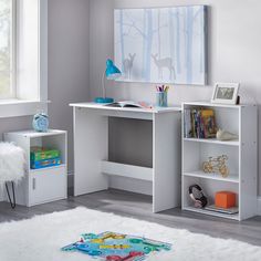 a child's desk with bookshelves and toys on it in a white room