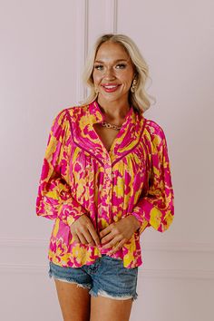 - Be bold and stylish with this vibrant top! - Unlined material with a yellow hued abstract print - A mock neckline - A pleated yoke with a crochet accent - Long, loose sleeves with button closure cuffs - A button up front - A relaxed silhouette that ends in a straight hemline Measurements S : Bust 38", Hip 46", Length 23", Sleeve Length 22.5", Waist 42". M : Bust 40", Hip 48", Length 24", Sleeve Length 23.5", Waist 44". L : Bust 42", Hip 50", Length 24.5", Sleeve Length 24", Waist 46". Wedding Games For Guests, Babydoll Tank, Lace Up Wedges, Summer Soiree, Metal Lace, Distressed Shorts, Mock Neckline, Curve Dresses, Sweater Blouse