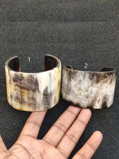 "You will receive 1 from any oF Ethically Sourced Natural Buffalo Horn Bone Jewelry Horn Cuff Bangle Bracelet Purely Handcrafted Antique Look Vintage Style Designer Fashion Jewelry Gift Sale    Bangle Width: 1.9 \" to 2\"  inches  Inner Diameter:  2.4\" to 2.5\"  inches   Many thanks for you visit my store ♥ if you have any question please contact us. For wholesale Price Please Convo me. You can order different items as many you like ." Handmade Rectangular Cuff Bracelet For Gifts, Handmade Cuff Bangle Bracelet, Handmade Bangle Cuff Bracelet, Handmade Rectangular Cuff Bracelet As Gift, Handmade Rectangular Bracelets, Handmade Rectangular Cuff Bracelet Gift, Handmade Cuff Bracelet As Fashion Accessory, Rectangular Brown Cuff Bracelet Gift, Vintage Hand Forged Cuff Bangle