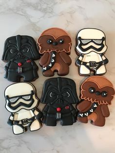 star wars cookies are arranged on a table