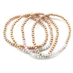 Add a touch of whimsy to your wrist with our Gold & Pastel Mix Gold Ball Stretch Bracelet Set. This set of four features a playful mix of soft pastel and shiny gold ball accents, perfect for adding a pop of color to any outfit. So go ahead, stack them up and let your unique style shine!   Set of 4 Elegant Adjustable Pastel Bracelets, Adjustable Multi-strand Gold Beaded Bracelets, 14k Gold-filled Bracelet With Colorful Round Beads, Gold Multi-strand Stackable Beaded Bracelets, Gold Stretch Bracelet With 14k Gold-filled Beads, Gold Flexible Stretch Bracelet, Stackable, Casual Blouse Shirts, Kendra Scott Necklace, Denim Shoes