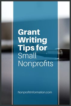 a pen sitting on top of a table with the words grant writing tips for small nonprofits