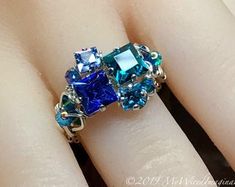 Multistone Mother's Ring Family or Daughters Ring | Etsy Blue Fusion Rings With Accent Stones, Dazzling Stone Rings For Gift, Dazzling Rings With Stones For Gift, Dazzling Rings With Stones As Gift, Handmade Fusion Style Promise Ring, Fusion Style Promise Ring With Accent Stones, Unique Emerald Cut Rings With Accent Stones, Unique Multi-stone Promise Rings, Handmade Fusion Rings For Anniversary