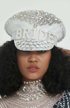 "Ensure the bride sparkles on her bachelorette weekend with this dazzling bridal hat, we unveiled our eye-catching Bride To Be Military Hat. Lavishly embellished, this eye-catching headpiece is a must-have accessory to make the bride feel like a queen for the weekend. Working closely with partners renowned for their embellishment techniques, we crafted the perfect design for these military-style caps. Every hat is painstakingly adorned with white sequins, shimmering crystals and pearl letters spelling out \"BRIDE\". For brides seeking a glamorous way to stand out at their celebration, this head-turning hat is the perfect choice. 🎩 This dazzling military-style cap features: *Glamorous Hat Spotlight - This dazzling hat captures all attention, putting the spotlight on you for the night. Beco Silver Bachelorette Party, Silver Bachelorette, Disco Hat, Embellishment Techniques, Rhinestone Veil, Veil Headband, Pearl Letters, Bride Hat, Bridal Hat