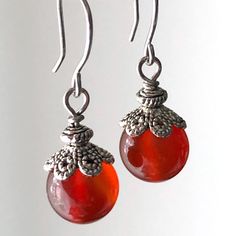 "6682 Carnelian Earrings red orange natural stone dangle drops simple modern classic everyday casual birthday anniversary Valentine's day Mother's day Christmas stuffing stockings holiday gift for her women mom sister wife girlfriend daughter niece aunt grandma cousin colleague best friend. Enjoy the beauty & power of natural gemstones. MATERIALS & DIMENSIONS ✦ Natural CARNELIAN, orange red, smooth round beads 10mm; ✦ SILVER plated bead caps, spacers, pins and fish hook ear wires; ✦ The total le Elegant Carnelian Earrings, Round Carnelian Earrings, Red Carnelian Earrings Perfect As A Gift, Red Carnelian Earrings, Carnelian Teardrop Earrings For Gift, Nickel-free Carnelian Jewelry, Red Carnelian Teardrop Earrings, Elegant Carnelian Earrings Gift, Elegant Carnelian Earrings For Gift