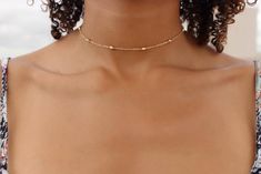 This gorgeous double layered Satellite Choker Necklace comes in either 14k Gold, Rose Gold or Silver plated (Tarnish Resistant) and is the perfect piece of fashion jewelry to add a touch of elegance to any outfit. Whether worn as part of your everyday wear or to a more formal occasion you'll be sure to shine! This item is also referred to as a Dainty Gold Necklace, Satellite Chain Choker and a Beaded Choker.MEASUREMENTSThe Satellite Chain Choker Necklace is made to be 13 inches long with a 2-inc Dainty Jewelry Necklace, Dainty Choker Necklace, Evil Eye Necklace Gold, Diamond Choker Necklace, Gold Chain Choker, Gray Jewelry, Choker Gold, Gold Hamsa, Dainty Choker