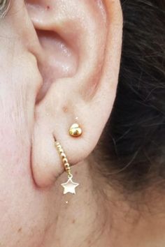 You're a star. Show the world in the Beaded Star Huggiesl These dainty earrings hug the lobe tightly, and they're the perfect size for layering and creating your dreamy ear stack! Add our Teeny Moon or Lighting Bolt Studs or added sparkle!

>> Beaded Star Huggies: https://pinealvisionjewelry.com/products/beaded-star-huggies Dainty Star Shaped Single Cartilage Earring, Hypoallergenic Star-shaped Cartilage Earrings For Everyday, Dainty Star Charm Piercings For Gifts, Beaded Star, Lighting Bolt, Ear Party, Star Show, Ear Stack, Dainty Studs