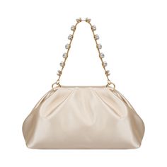 This elegant bag is crafted from satin with a vibrant beige color and features intricate twist detailing. Adorned with embroidered Swarovski stones on the handle, it adds a touch of luxury to your look. With dimensions of 23 cm in width, 8 cm in height, and 11 cm in length, it offers ample space for your essentials. Additionally, it comes with a dustbag for protection and convenience. Color: Beige Embroidered Swarovski stones on the handle Satin surface Twist detailing Comes with a dustbag  Dimensions: Width: 23 cm Height: 8 cm Length: 11 cm Feminine Beige Evening Bag, Beige Feminine Evening Bag, Feminine Beige Evening Bag For Formal Occasions, Luxury Beige Clutch With Detachable Handle, Glamorous Beige Clutch Evening Bag, Elegant Beige Clutch Evening Bag, Feminine Beige Clutch For Evening, Luxury Evening Bag With Pearl Handle For Events, Beige Chic Evening Clutch