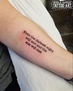 a person with a tattoo on their arm