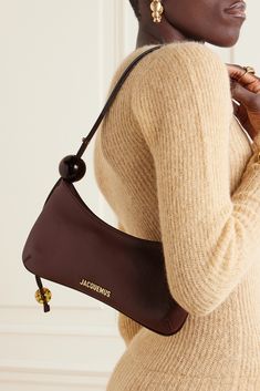 The curved shape of Jacquemus' 'Le Bisou Perle' bag is timelessly elegant. Crafted from smooth leather, it's embellished with resin spheres at either end of the sleek shoulder strap. The gold-tone hardware is polished for subtle sparkle. Brown Shoulder Bag Outfit, Shoulder Bag Outfit, Brown Shoulder Bag, Mini Shoulder Bag, Mr Porter, Clutch Wallet, Net A Porter