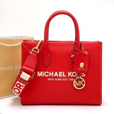 Michael Kors Mirella Small Shopper Top Zip Xbody Bright Red Color Whether You’re Heading To A Daytime Event Or Simply Running Errands, The Mirella Will Meet The Moment. Fit All Your Essentials Into This Charming Mini Tote, Which Can Be Carried By The Top Handles Or Worn Cross-Body Thanks To A Removable Strap. Crafted From Pebbled Leather Embossed With Our Iconic Lettering And Charm, It’s A Reliable Way To Spice Up Any Outfit. Details Crossbody Bag Pebbled Leather 100% Leather Trim: 60% Polyureth Hanging Belly, Purses Luxury, High End Handbags, New Look Fashion, Red Glasses, Girly Bags, Cute Purses, Best Bags, Mini Tote